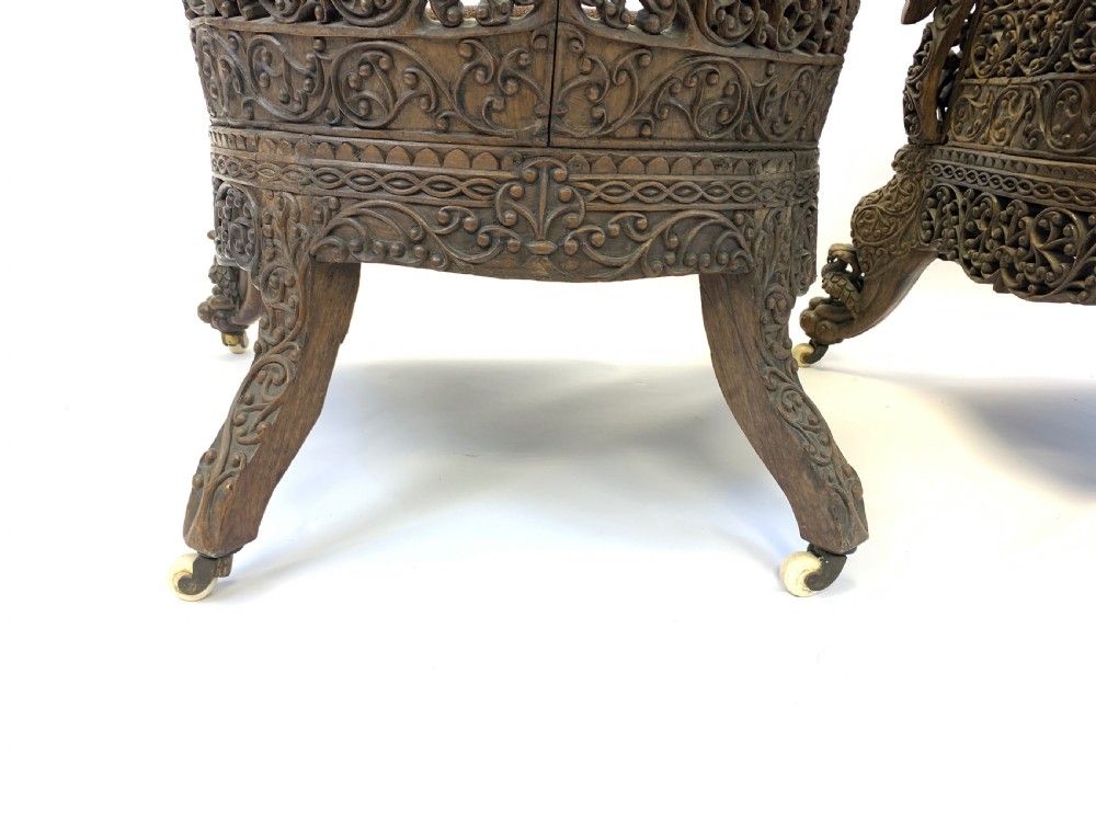 PAIR OF CARVED HARDWOOD ANGLO INDIAN ARM CHAIRS FROM THE BOMBAY PRESIDENCY, 19TH CENTURY  View IX