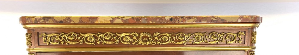 A 19th-century French Louis XVI style mahogany vitrine cabinet featuring glass side panels, gilt bronze mounts, a parquetry lower section, and a marble top. View IV