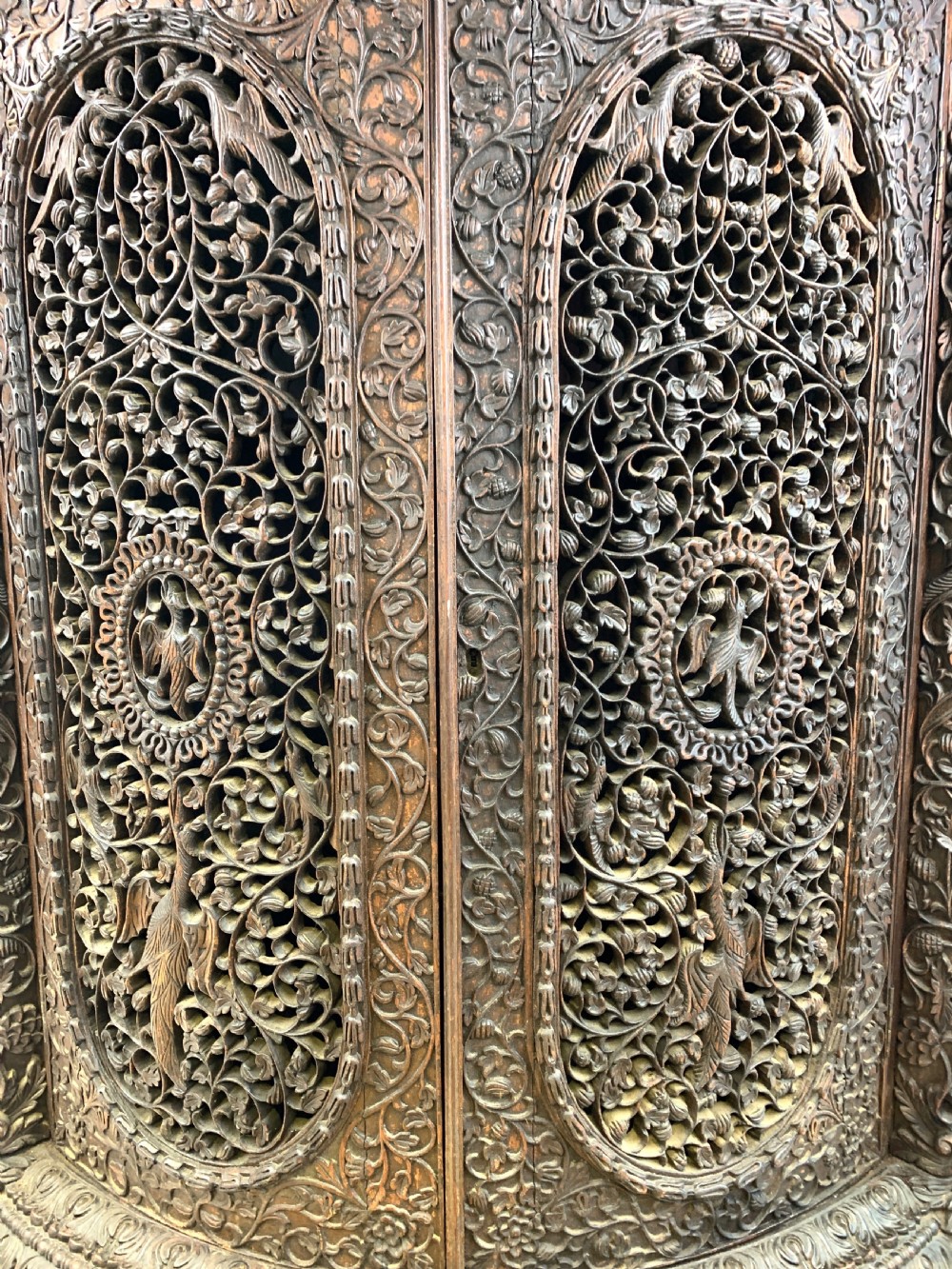 HEAVILY CARVED ANGLO INDIAN CORNER CABINET, 19TH CENTURY   View VIII
