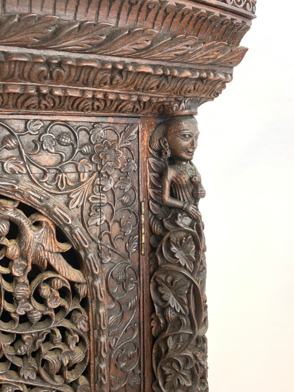 HEAVILY CARVED ANGLO INDIAN CORNER CABINET, 19TH CENTURY   View IX