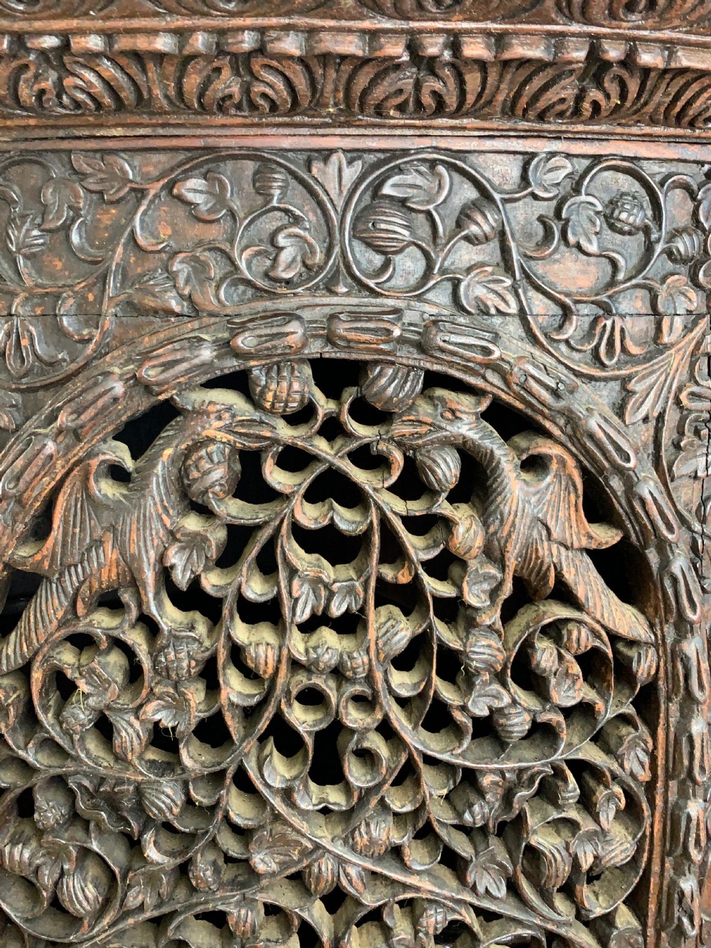 HEAVILY CARVED ANGLO INDIAN CORNER CABINET, 19TH CENTURY   View X