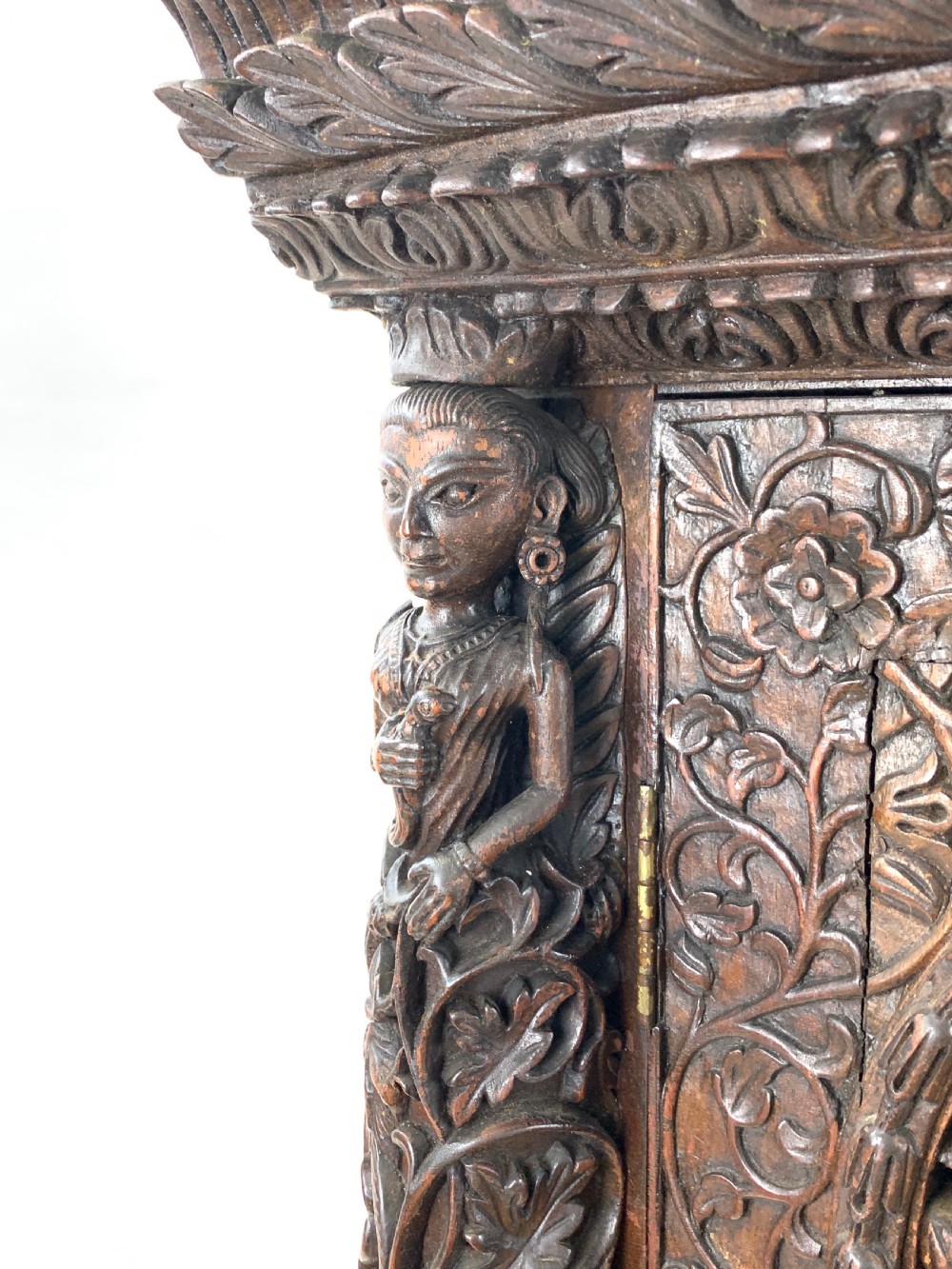 HEAVILY CARVED ANGLO INDIAN CORNER CABINET, 19TH CENTURY   View XI