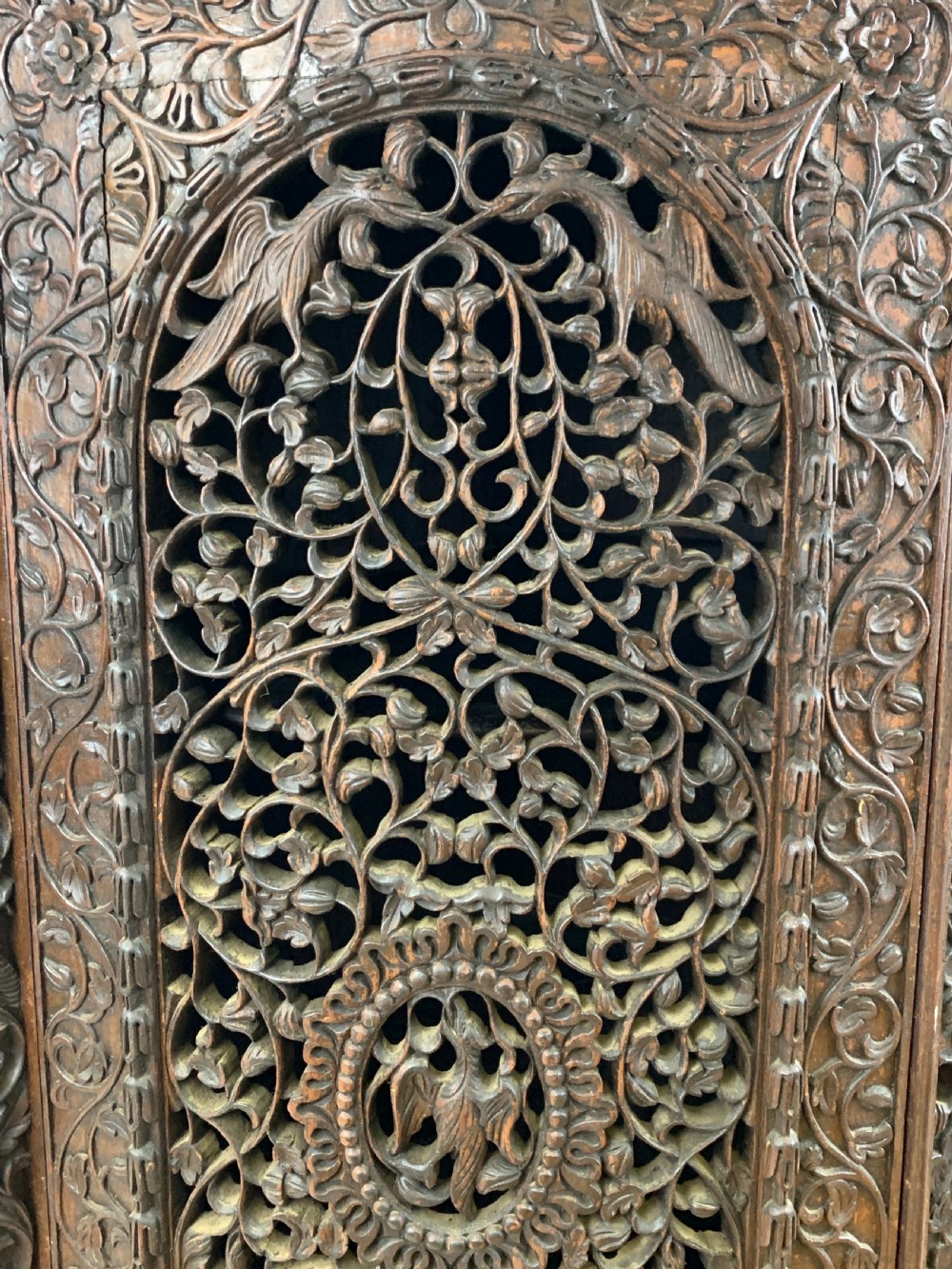 HEAVILY CARVED ANGLO INDIAN CORNER CABINET, 19TH CENTURY   View XII