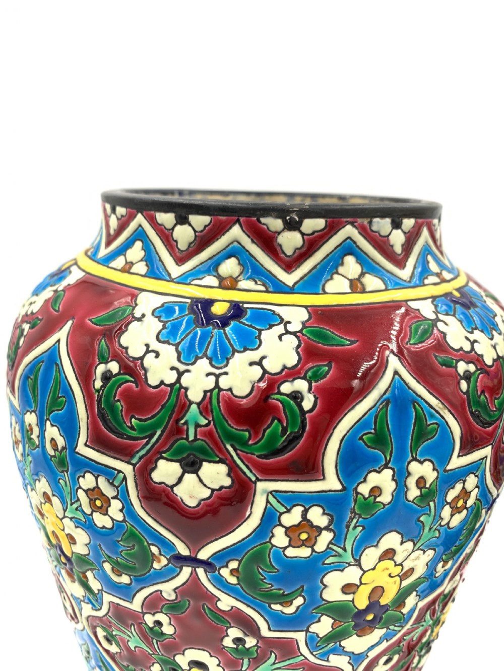 A pair of baluster-shaped French faience vases decorated with vibrant blue, crimson, and yellow enamelled floral arabesque patterns. View III