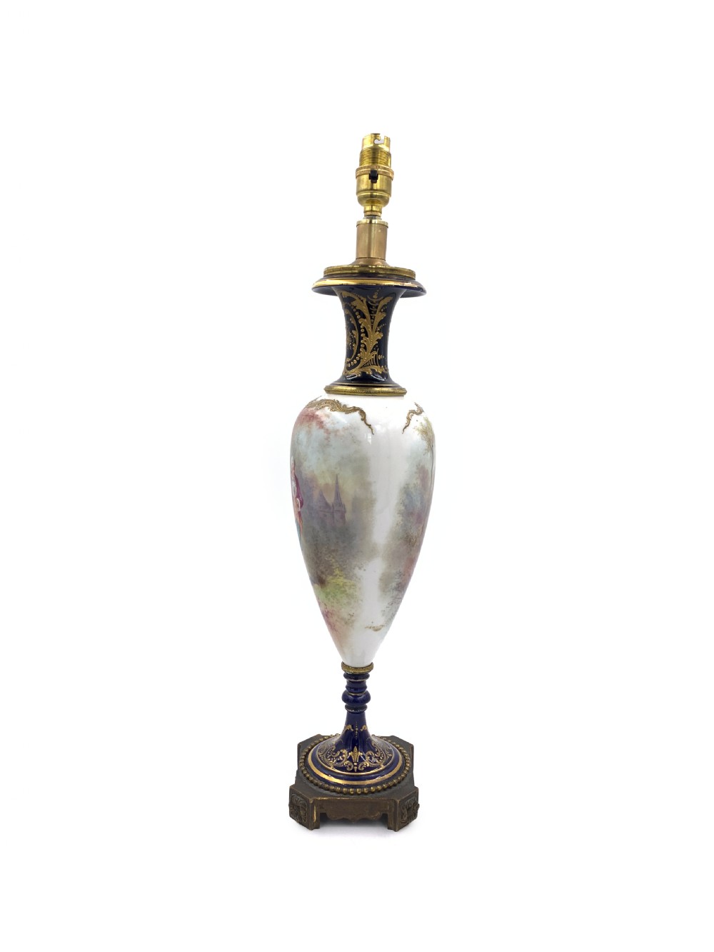 A 19th-century French Sevres style porcelain urn table lamp featuring hand-painted figures, cobalt blue accents, gilt detail, and a pleated silk shade. View III