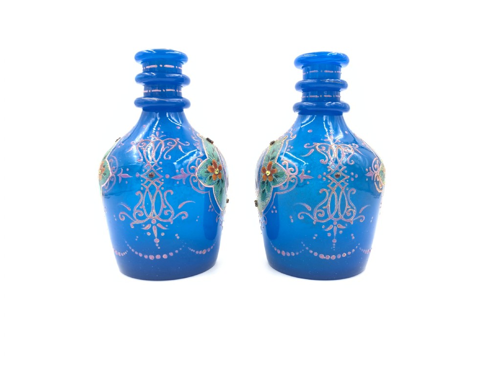 A PAIR OF ROYAL BLUE OPAQUE JEWELLED AND ENAMELLED BOHEMIAN GLASS HOOKAH BASES WITH PORTRAITS OF SULTAN MOZAFFAR AL-DIN SHAH QAJAR DATED 1315 HIJRI  View II