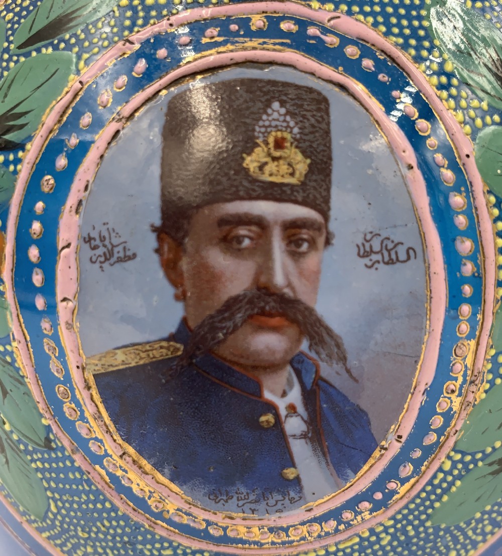 A PAIR OF ROYAL BLUE OPAQUE JEWELLED AND ENAMELLED BOHEMIAN GLASS HOOKAH BASES WITH PORTRAITS OF SULTAN MOZAFFAR AL-DIN SHAH QAJAR DATED 1315 HIJRI  View V