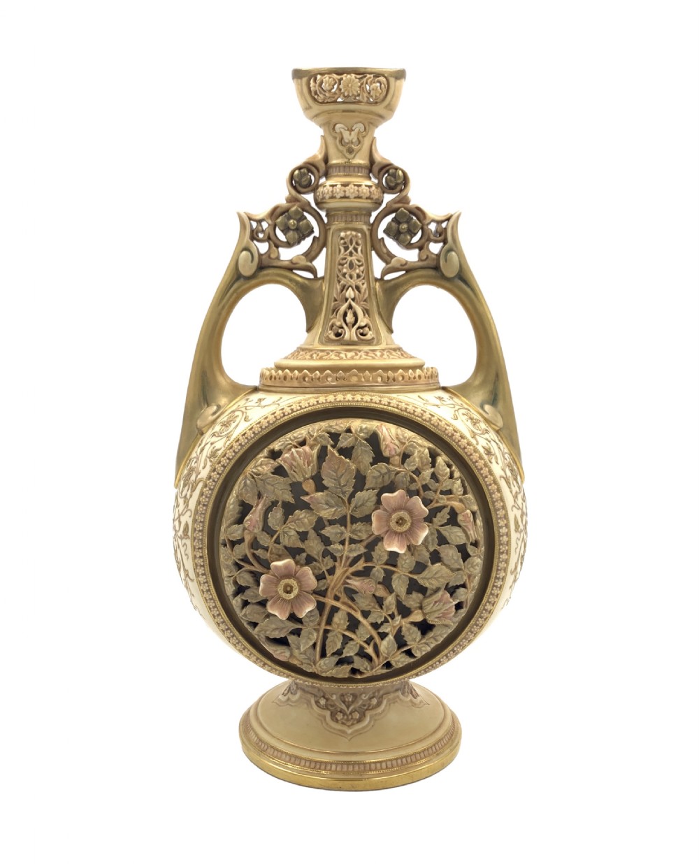 A late 19th-century Royal Worcester porcelain vase featuring twin handles, pierced reticulated panels, gilt accenting, and relief floral decoration on a blush ivory surface.