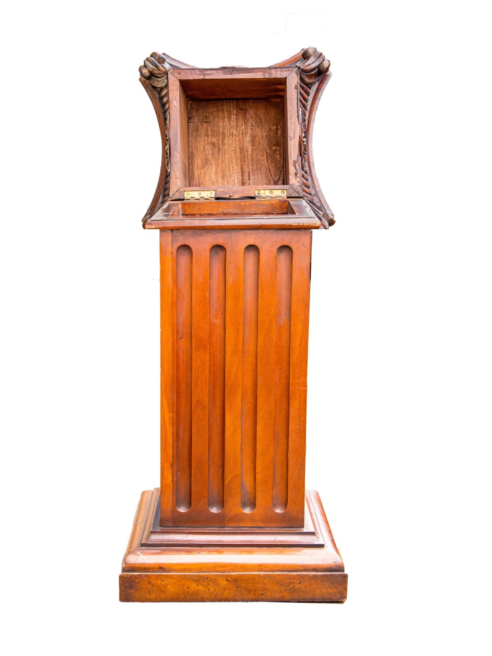 A pair of warm brown carved wooden pedestals featuring fluted shafts, ionic volutes, carved floral rosettes, and stepped square bases. View II