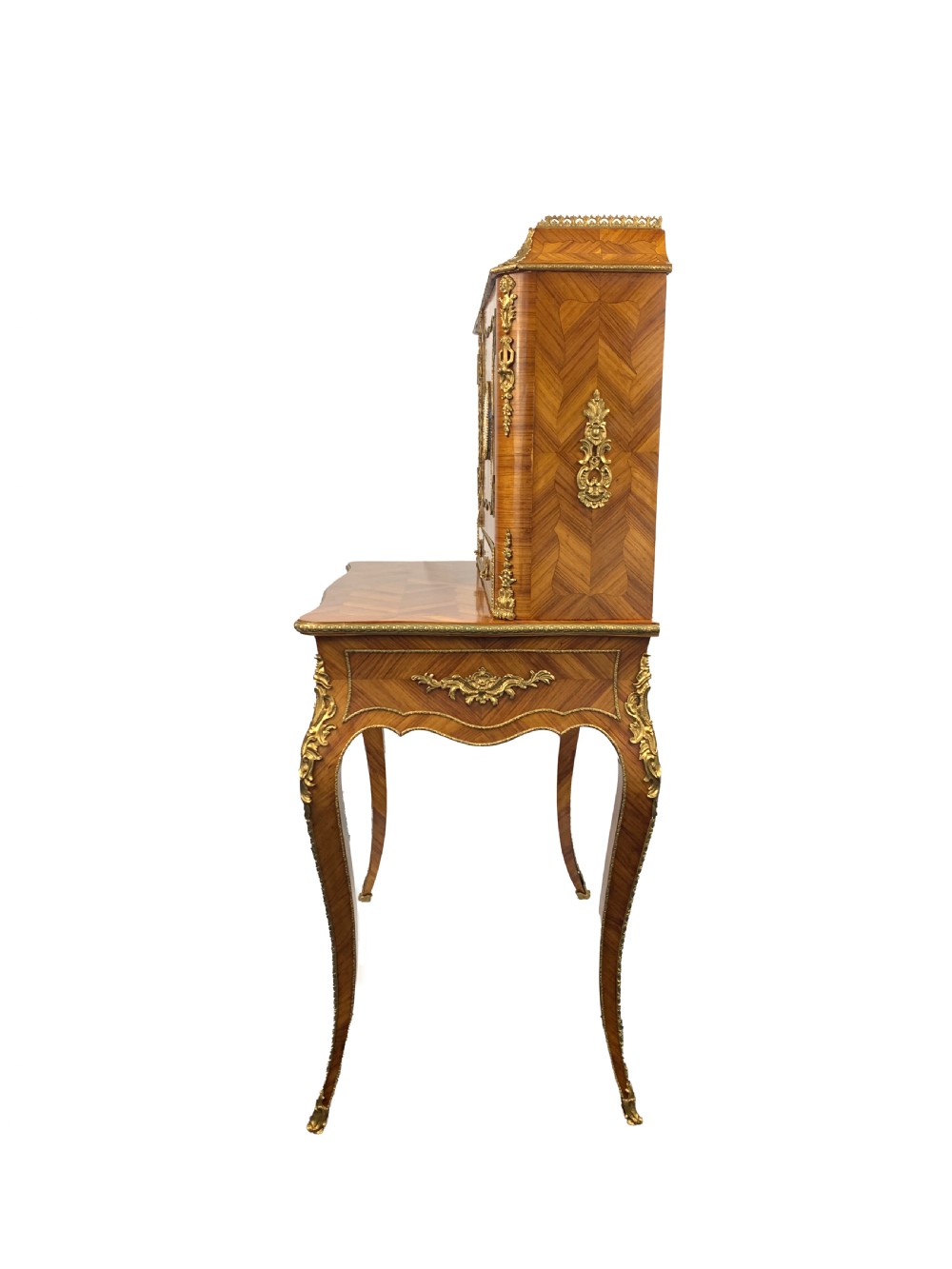 A late 19th-century French kingwood bonheur du jour featuring parquetry veneers, gilt-bronze mounts, oval porcelain plaques, and curved cabriole legs. View IV