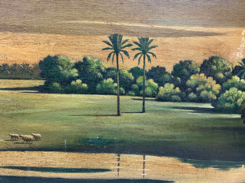 An oil painting on canvas depicting a desert landscape with camels, Bedouin tents, and palm trees under a golden sky, set within a gilded frame. View VI