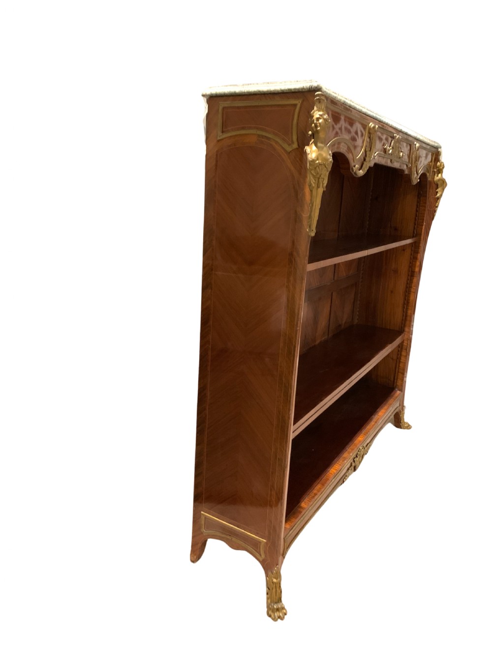 A French Louis XV style low open kingwood bookcase with parquetry backing, two shelves, gilt-bronze mounts, and a marble top. View II