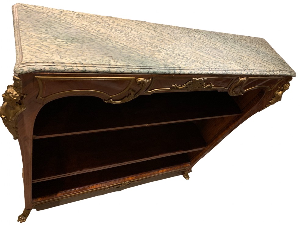 A French Louis XV style low open kingwood bookcase with parquetry backing, two shelves, gilt-bronze mounts, and a marble top. View III