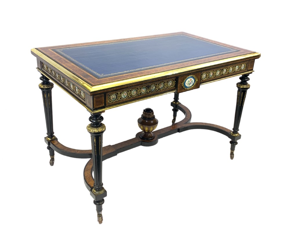 A VICTORIAN AMBOYNA WOOD AND EBONISED WRITING DESK WITH SEVRES STYLE PORCELAIN PLAQUES 