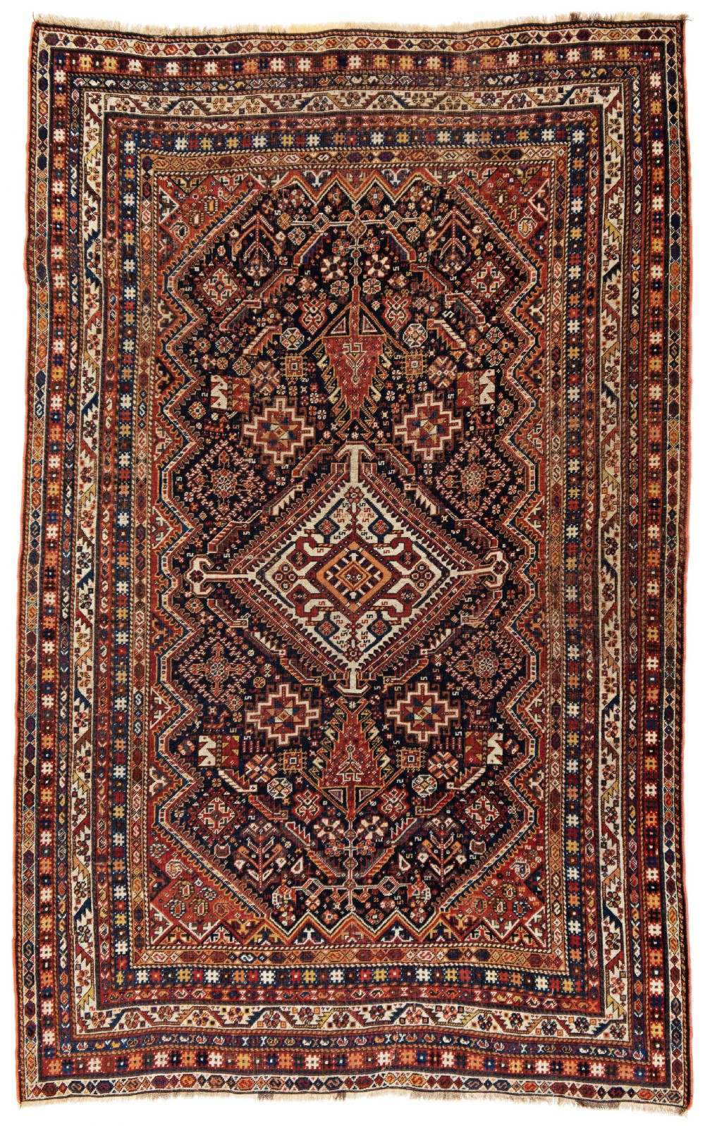A 19th-century Persian Qashqai hand-knotted wool rug featuring geometric diamond medallions in terracotta red, indigo blue, and cream.