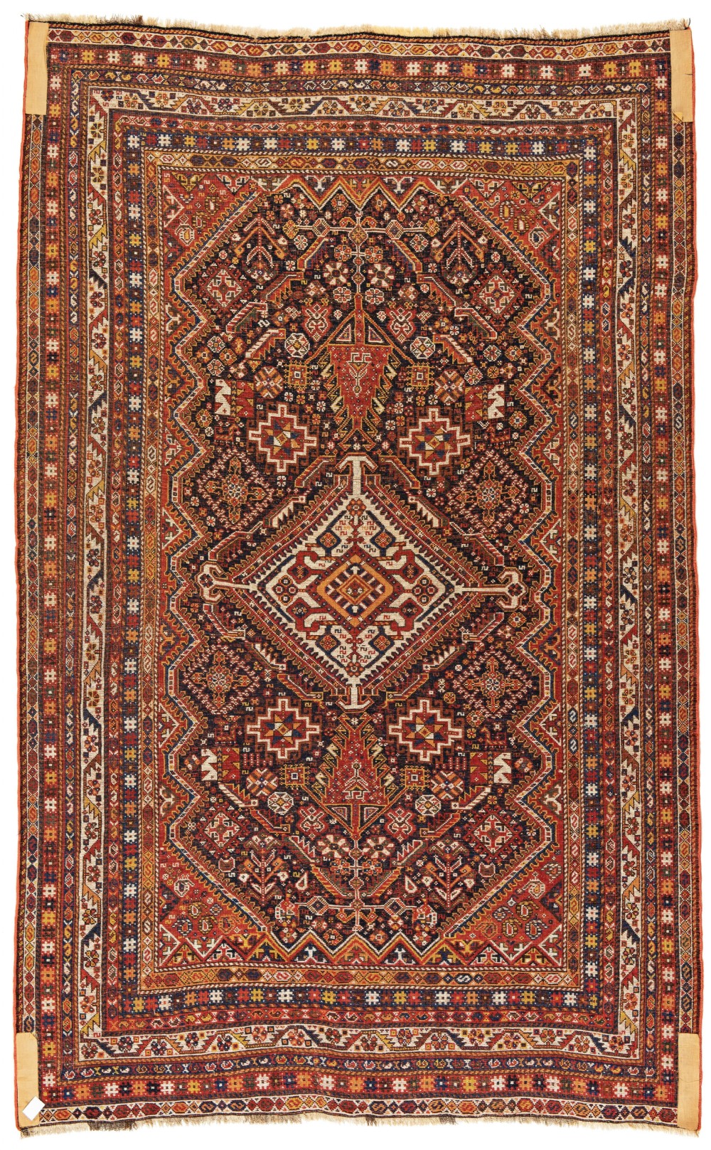 A 19th-century Persian Qashqai hand-knotted wool rug featuring geometric diamond medallions in terracotta red, indigo blue, and cream. View II