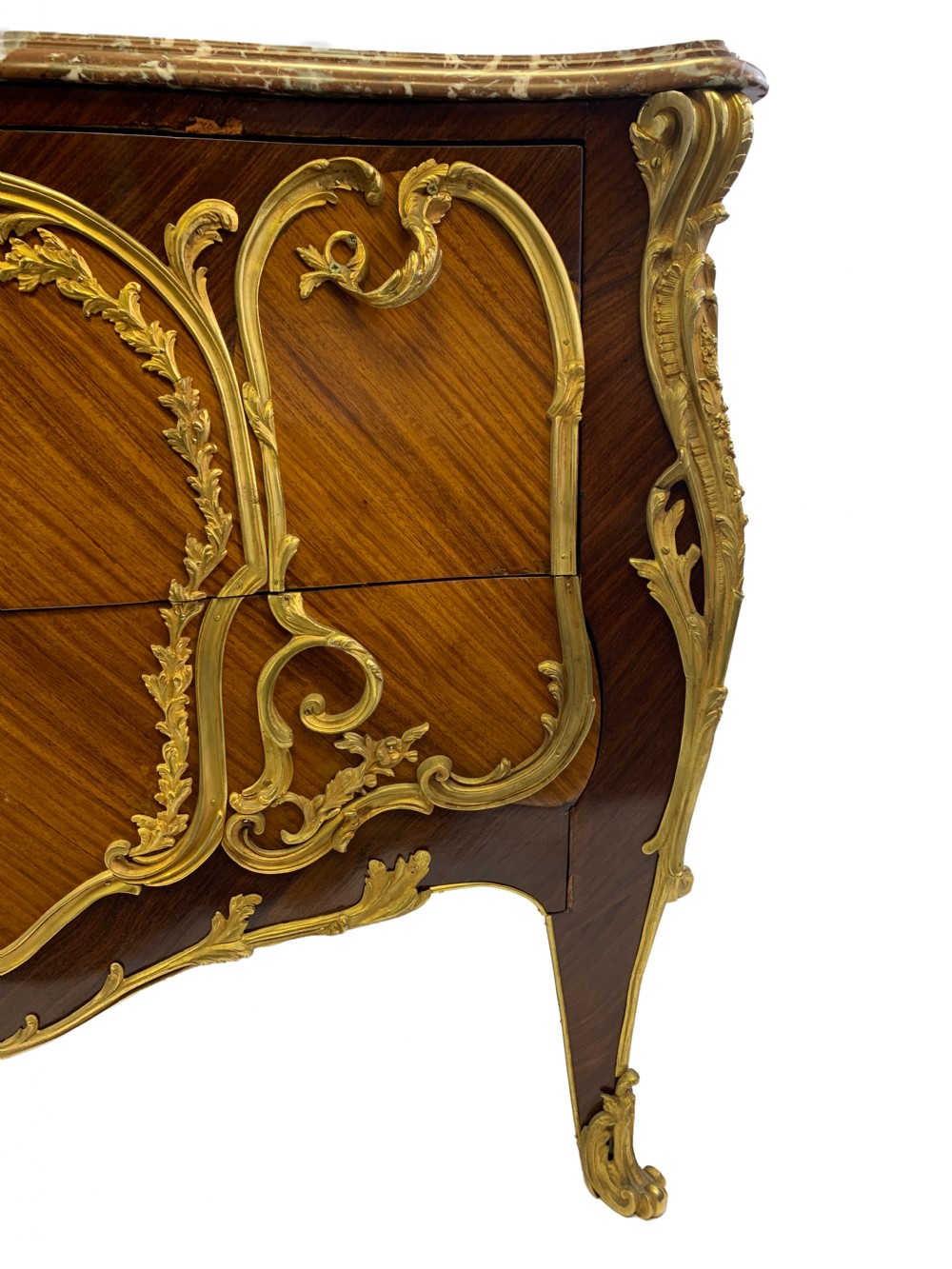 A French Louis XV style bombe commode featuring rich kingwood parquetry veneers, ornate gilt-bronze ormolu mounts, cabriole legs, and a shaped variegated marble top. View VII