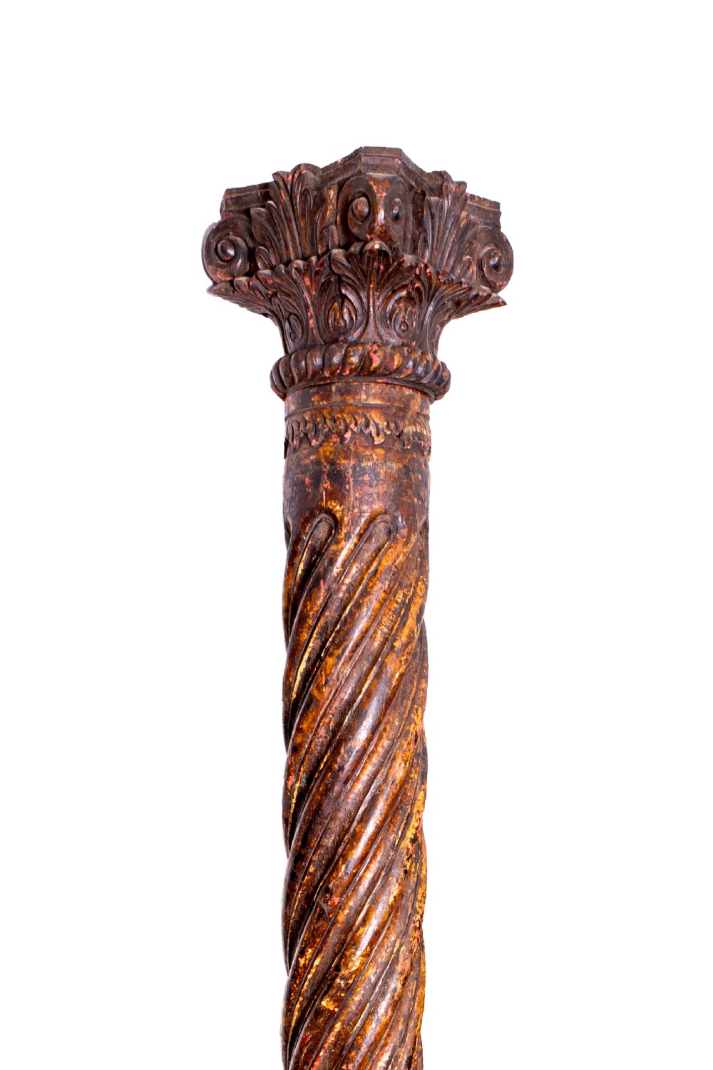 A pair of 19th-century hand-carved dark wood columns featuring spiral twist shafts, ornate acanthus leaf capitals, and square bases. View II