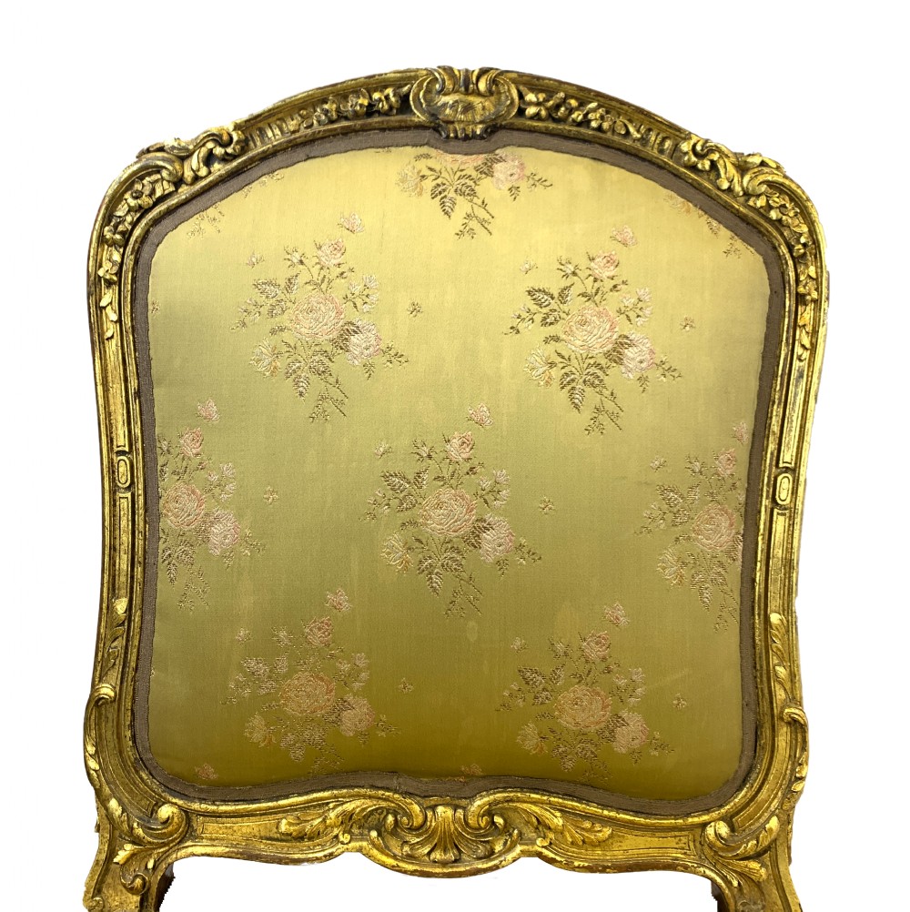 A pair of late 19th-century Rococo Revival giltwood side chairs upholstered in patterned green silk fabric with carved cabriole legs. View V
