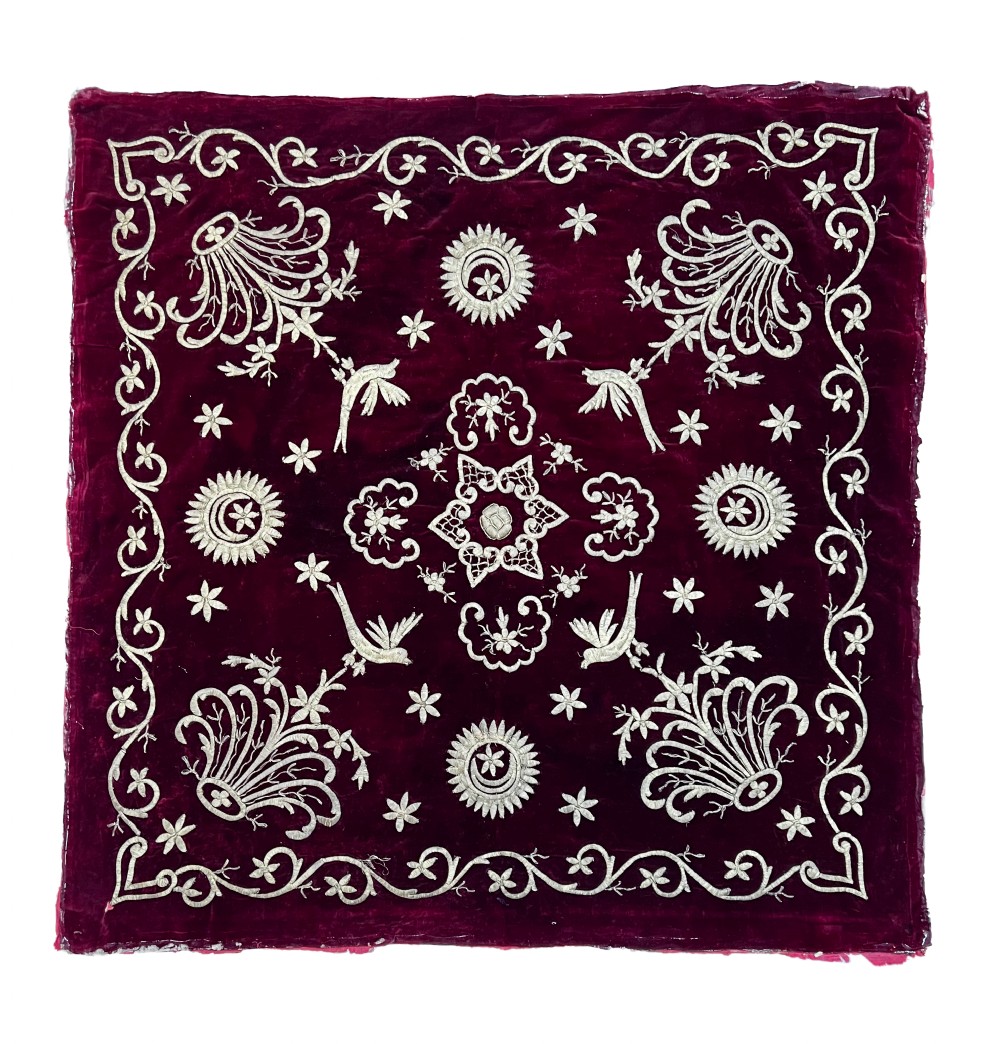 Six individual square 19th-century Ottoman velvet panels in deep blue, purple, and crimson, decorated with intricate gold and silver metallic thread embroidery. View V