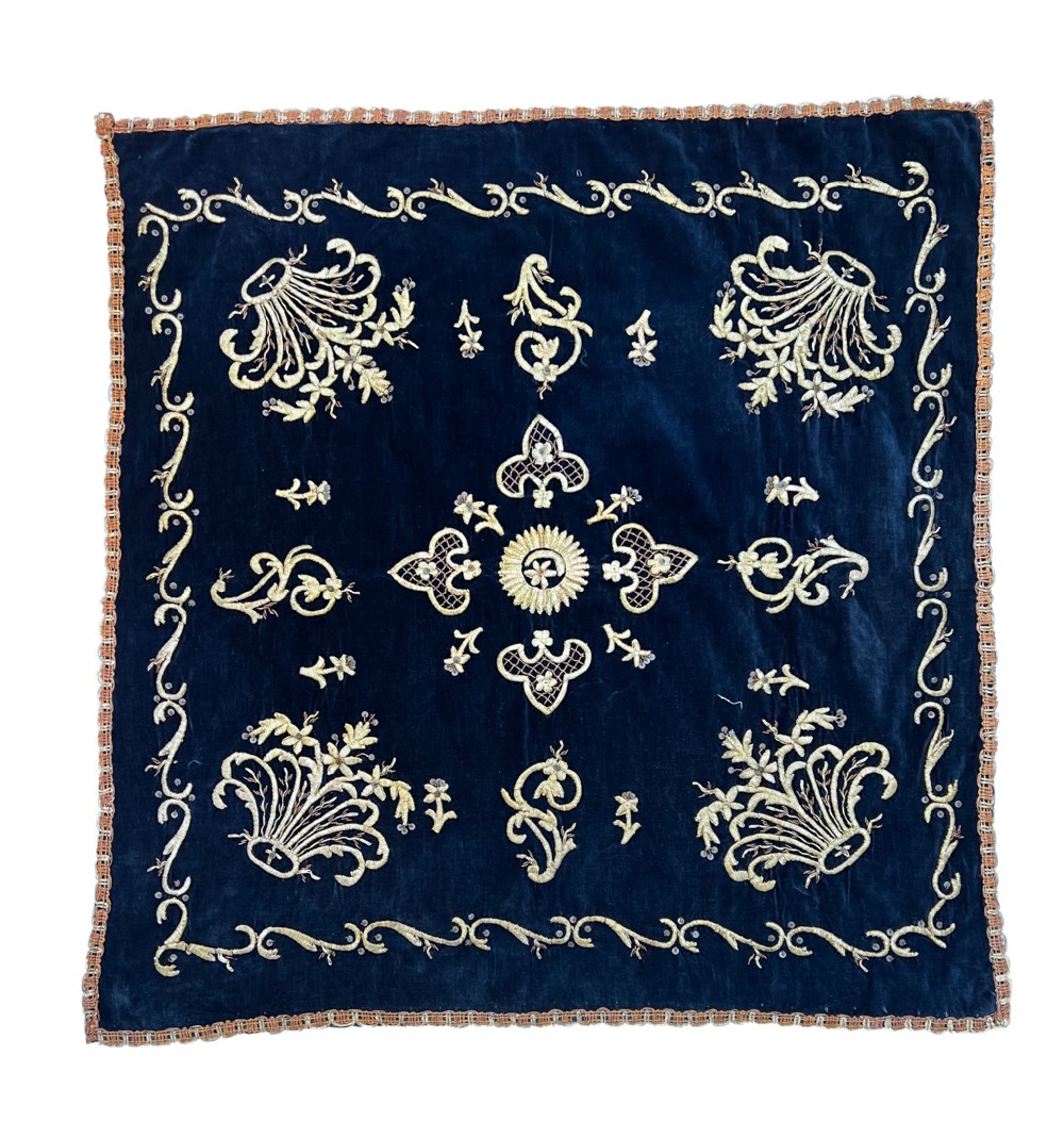 Six individual square 19th-century Ottoman velvet panels in deep blue, purple, and crimson, decorated with intricate gold and silver metallic thread embroidery. View VI