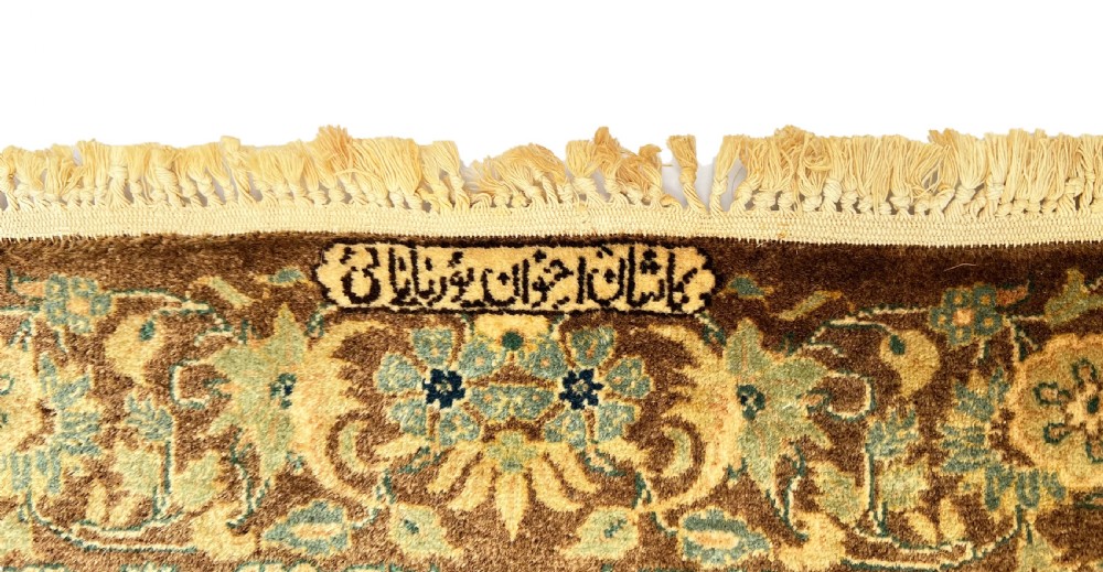 A pair of matching hand-knotted wool Kashan rugs featuring architectural scenes with minarets, domes, Arabic calligraphy, and ornate floral borders. View VII