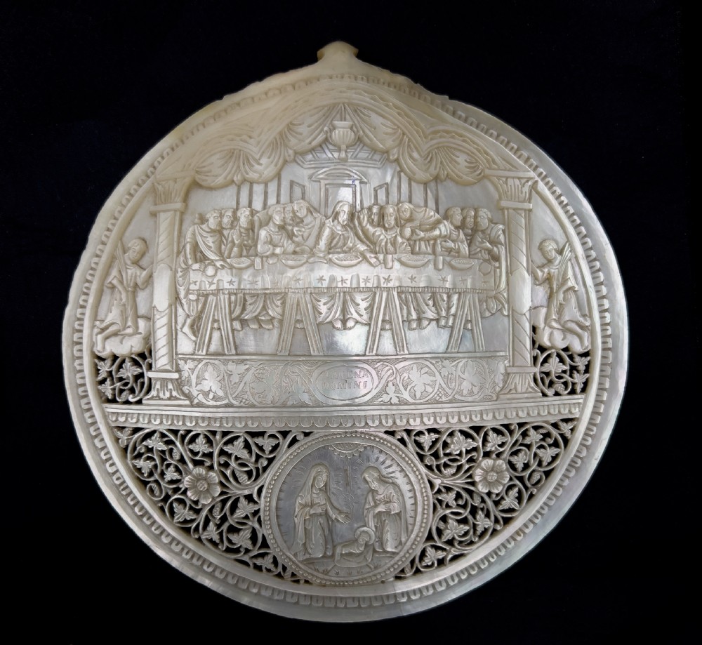 A set of five intricately hand-carved mother of pearl shells depicting biblical scenes with detailed pierced fretwork borders. View II