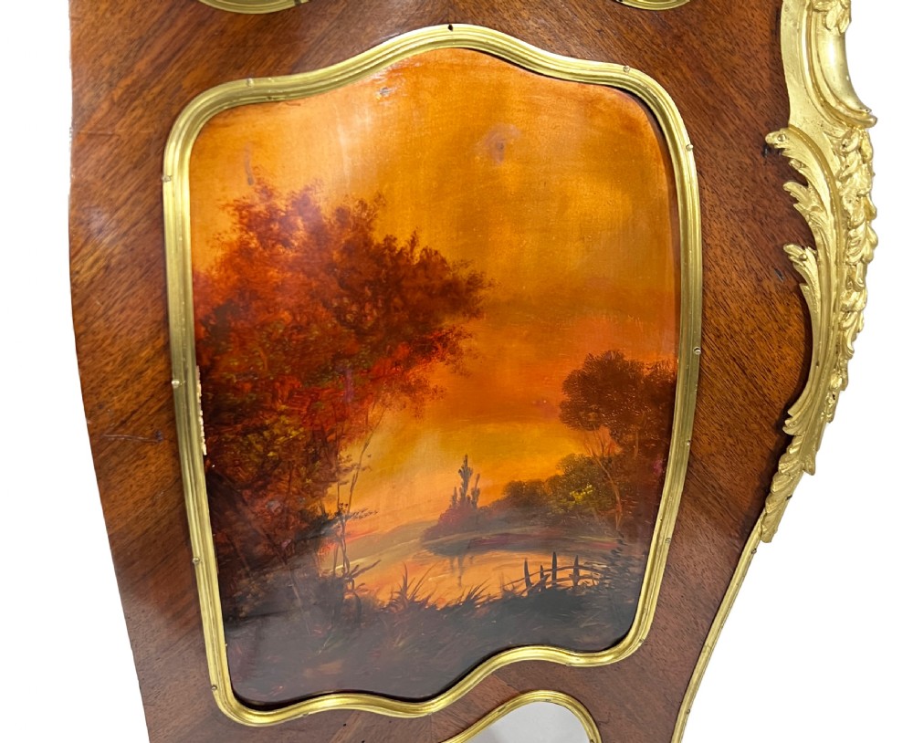 A serpentine French Louis XV style vitrine cabinet featuring gilded ormolu mounts, glazed glass door, and a hand-painted Vernis Martin lower panel depicting romantic figures. View IX