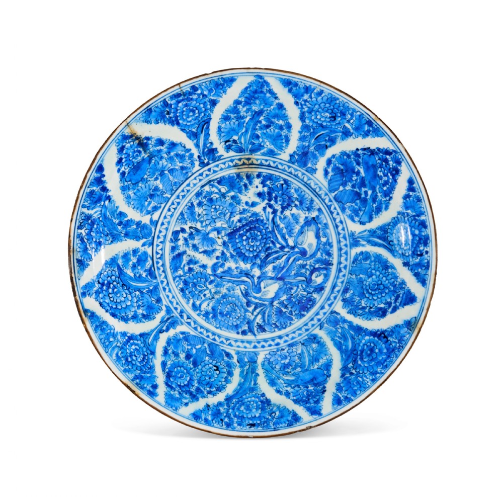 A Large Safavid Blue And White Pottery Dish, Iran, Late 17Th - Early 18Th Century
