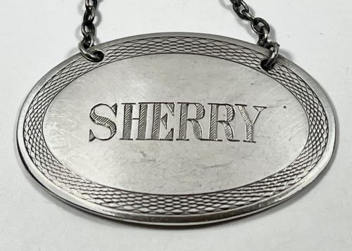 George V antique silver oval “Sherry” label, London 1918