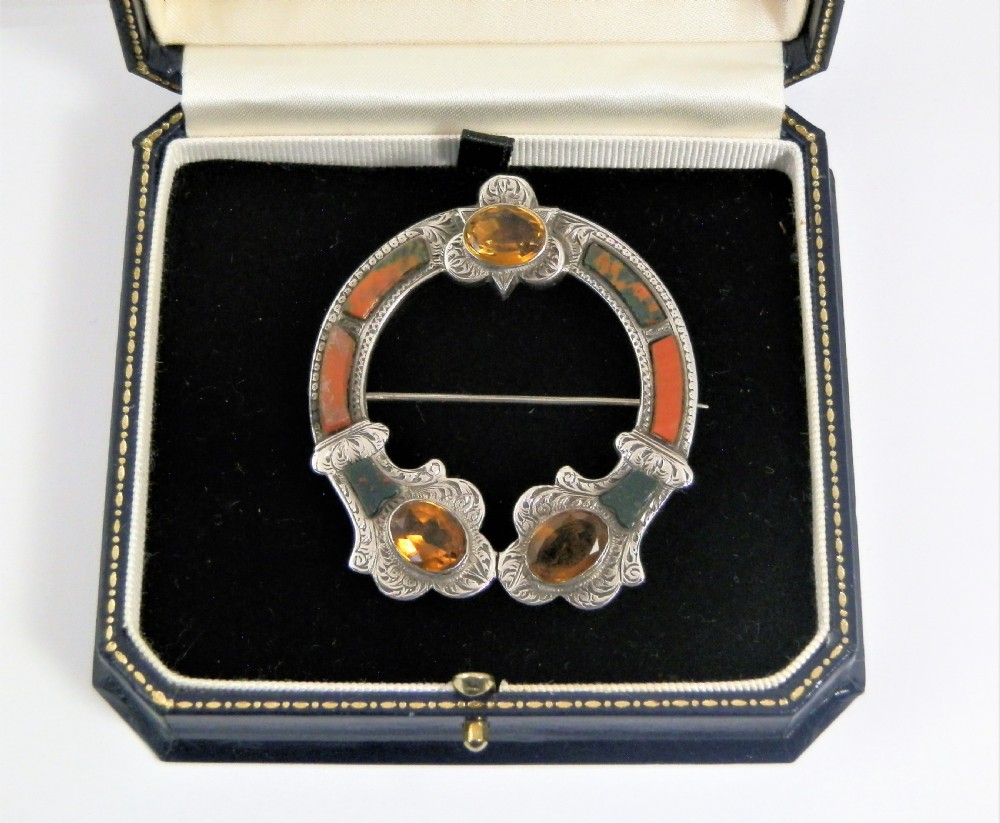 A Scottish Victorian silver agate penannular style brooch, c1880