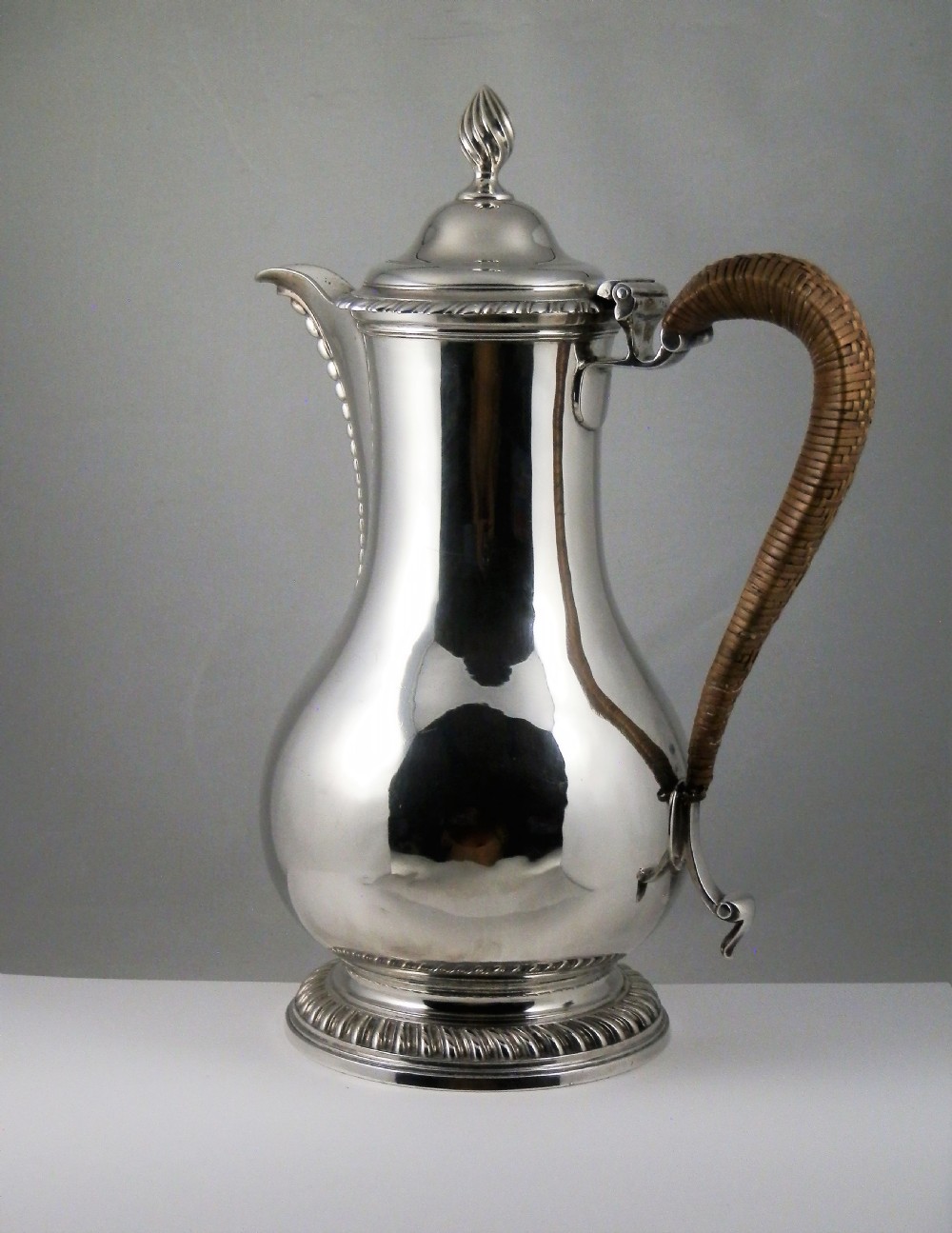 George III large silver coffee or hot water jug, London 1773