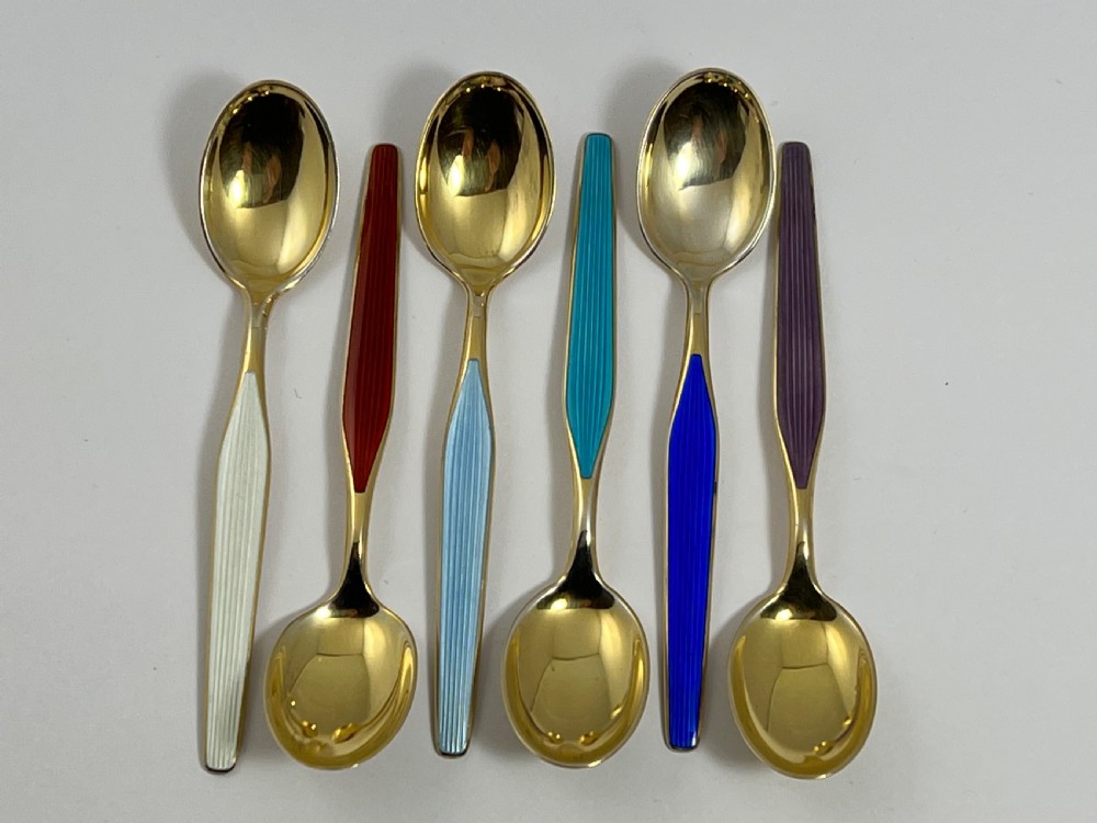 6 Norwegian silver gilt and enamel spoons,c 1970