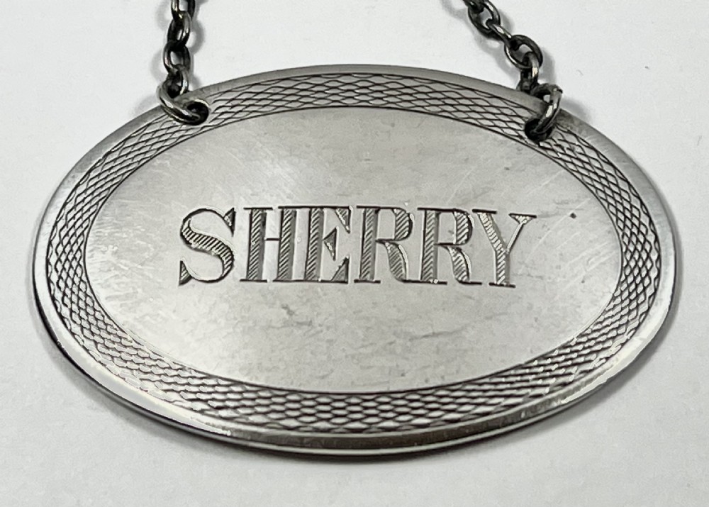 George V antique silver oval “Sherry” label, London 1918