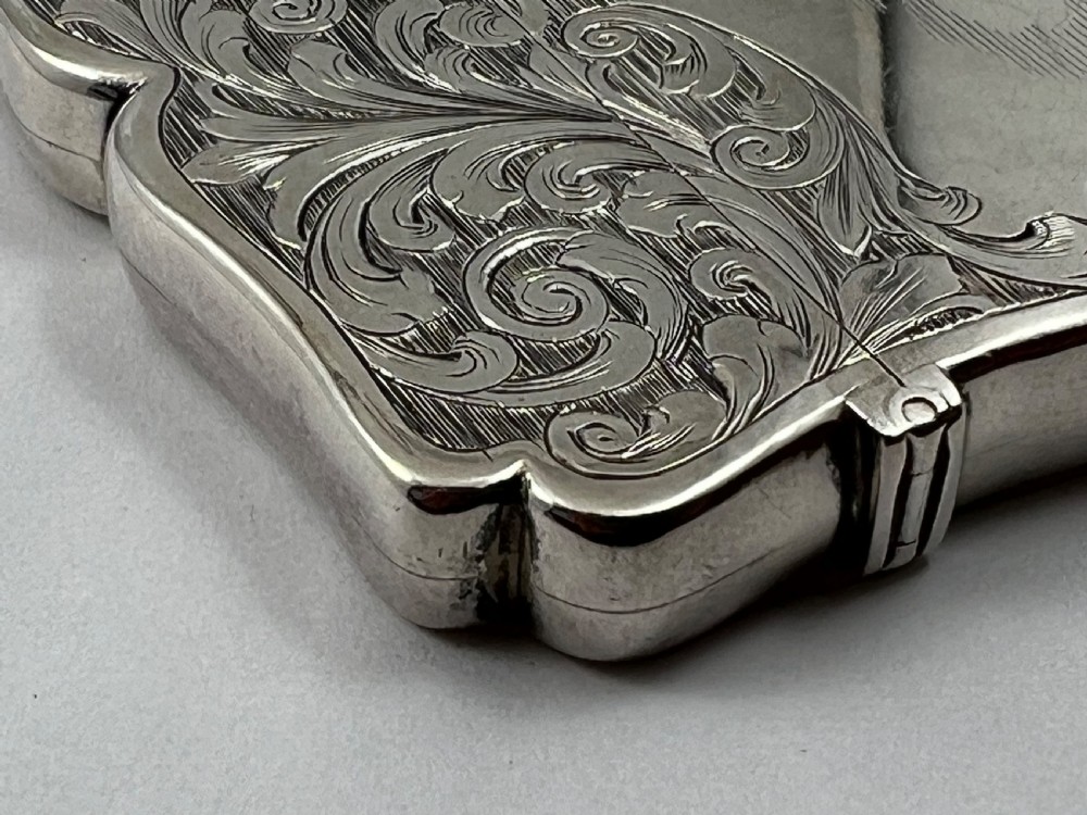 An engraved sterling silver card case featuring a central depiction of St Pauls Cathedral framed by intricate scrollwork. View VIII