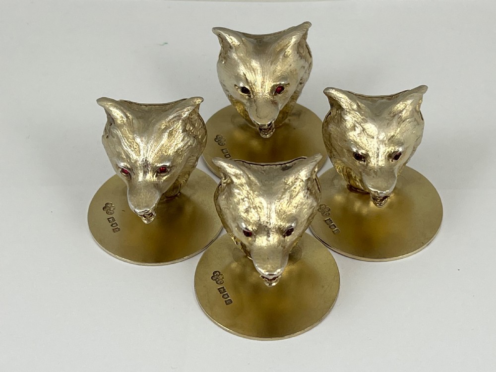 George V 4 antique silver gilt fox head menu holders, London 1912