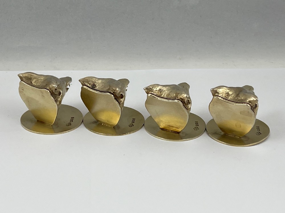 George V 4 antique silver gilt fox head menu holders, London 1912 View IV