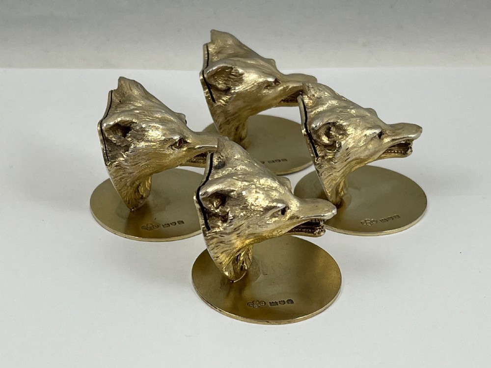 George V 4 antique silver gilt fox head menu holders, London 1912 View V