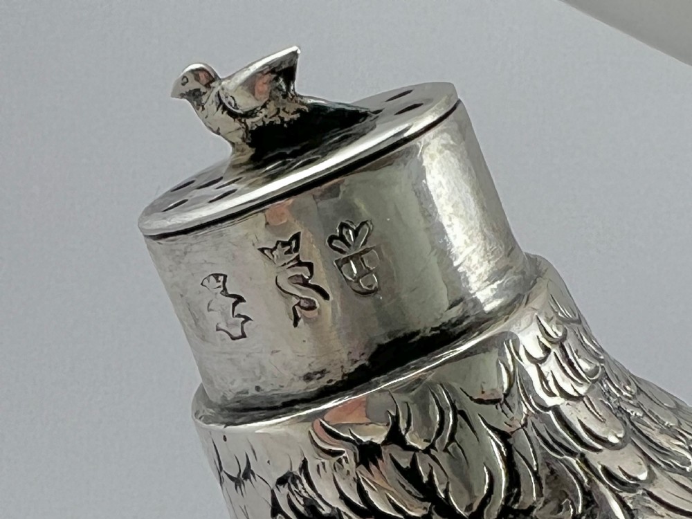 An antique silver woodcock figure depicted standing with realistic chased feather detailing and a long slender beak. View VIII