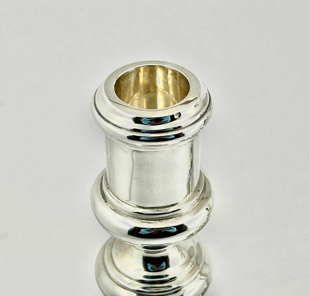 George VI matched pair of silver candlesticks, London 1931/52 View X