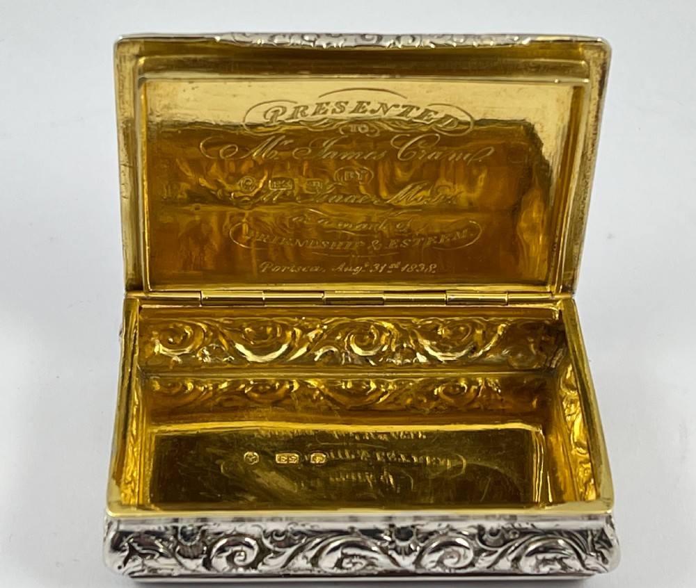 Rectangular sterling silver snuff box featuring a relief-carved hunting scene with a rider on horseback surrounded by hounds in a woodland setting. View VI
