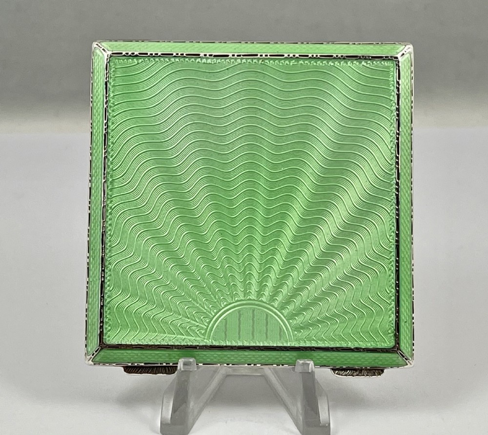 A stunning Elizabeth II green enamel and silver compact, 1953 View VI