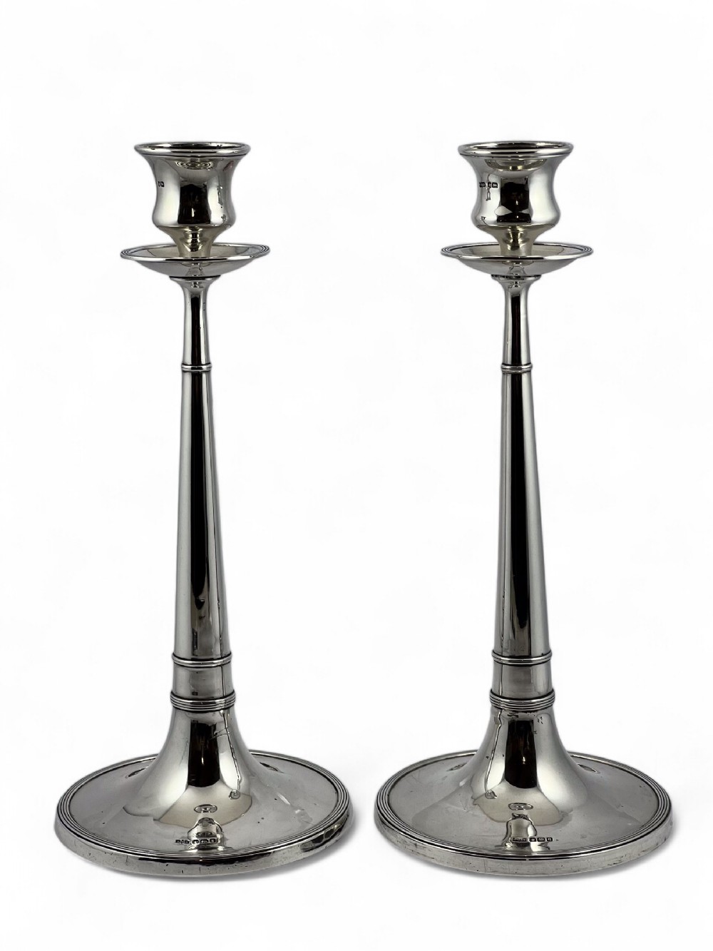 An Art Nouveau pair of antique silver candle sticks, Sheffield 1908