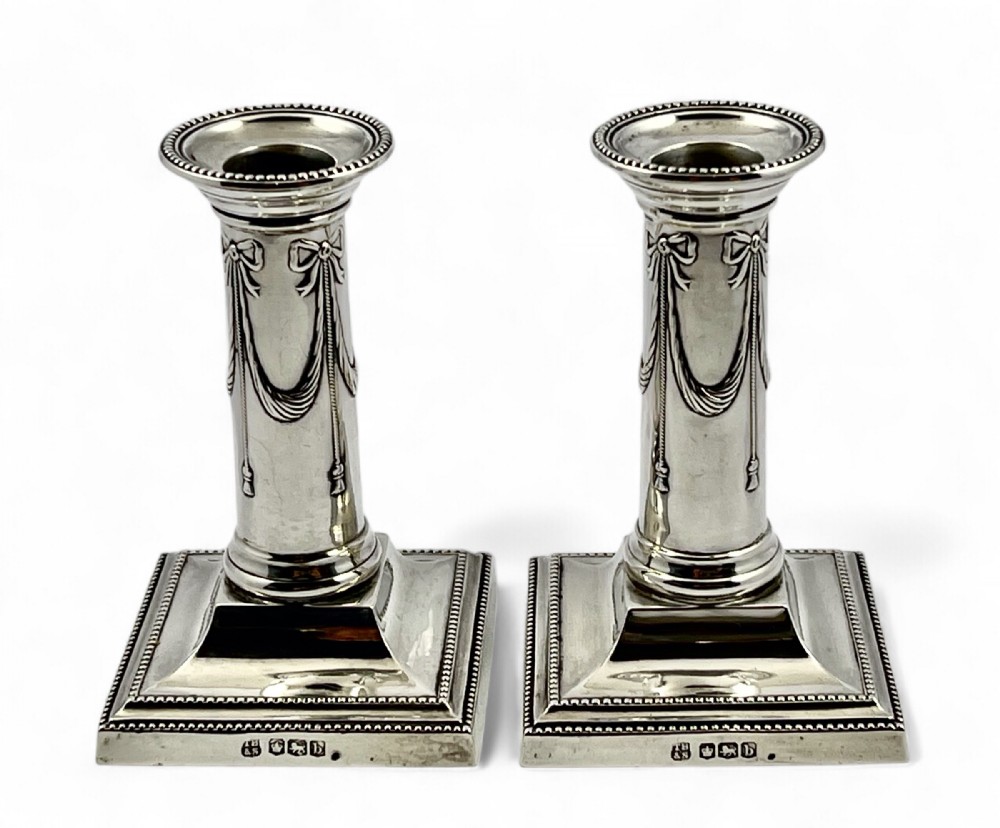 George V pair of small antique silver candlesticks, Sheffield 1919