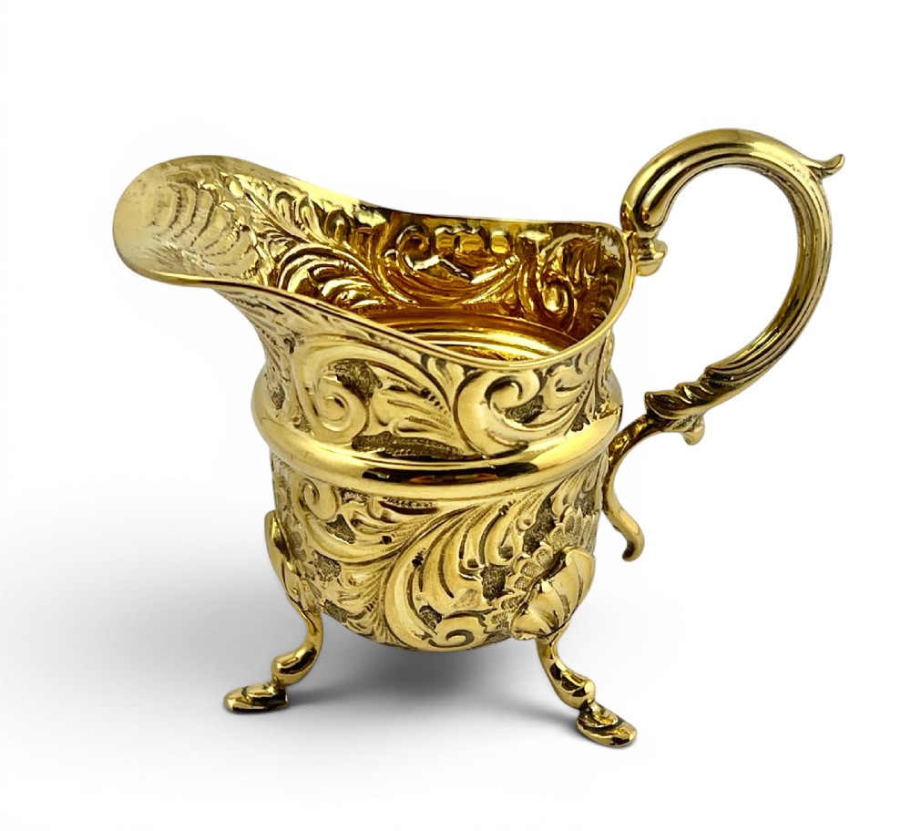 Edwardian antique silver gilt cream jug, Birmingham 1905