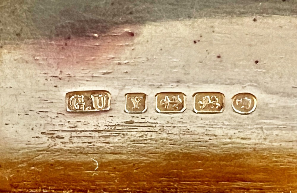 An antique Victorian sterling silver oblong table snuff box featuring engine-turned geometric engraving and an unengraved oval central cartouche on the hinged lid. View VIII