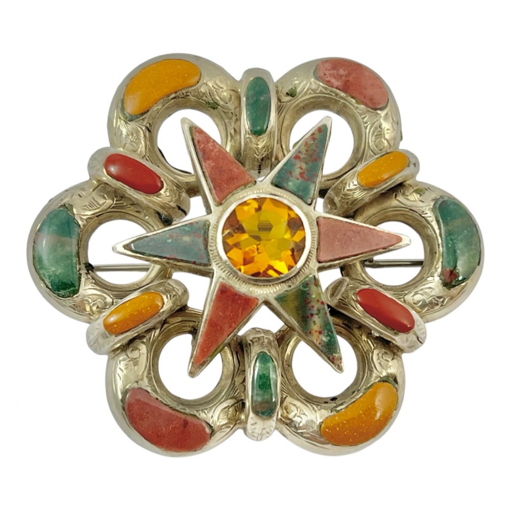 Victorian silver Scottish brooch with inlaid multicoloured agates surrounding a central star motif set with a faceted yellow citrine. View IV