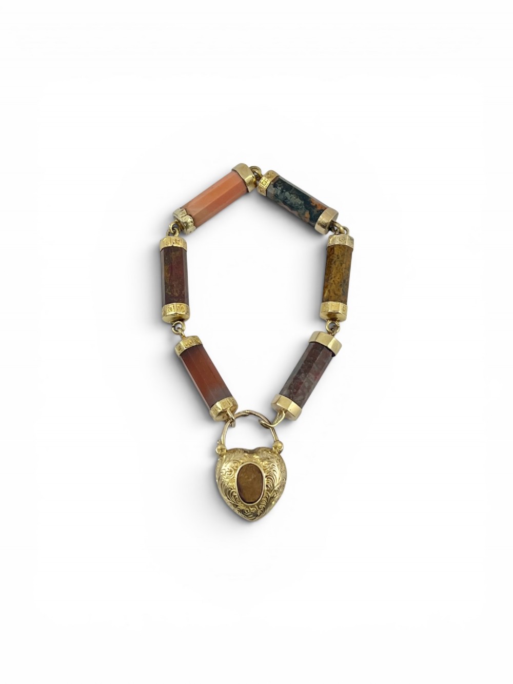 A Victorian 9ct gold bracelet featuring cylindrical faceted agate stone links connected by gold bands and an engraved heart padlock clasp. View III