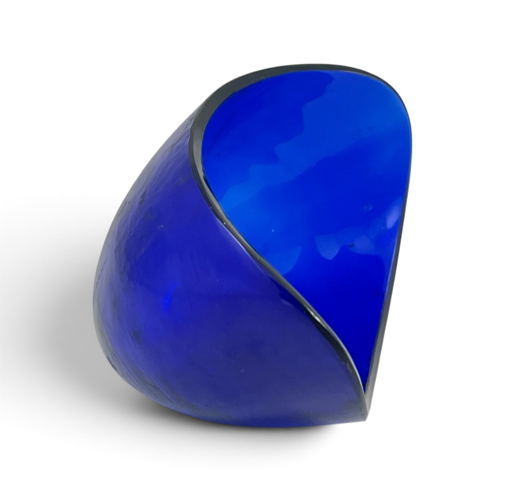 A George III sterling silver sugar basket featuring pierced geometric engraving, a beaded swing handle, a pedestal base, and a fitted cobalt blue glass liner. View VI