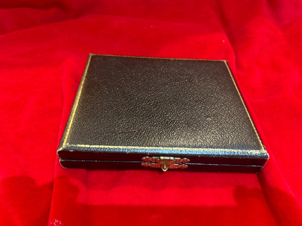 A cased set of six silver spoons featuring vibrant, colourful guilloche enamel bowls housed inside a satin-lined fitted presentation box. View V